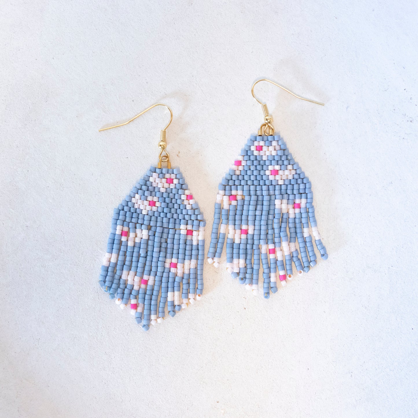 flying hearts | beaded statement earrings